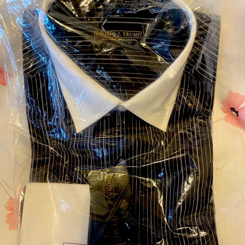 Brand new in plastic tags on black & white stripe size 16 men’s shirt.